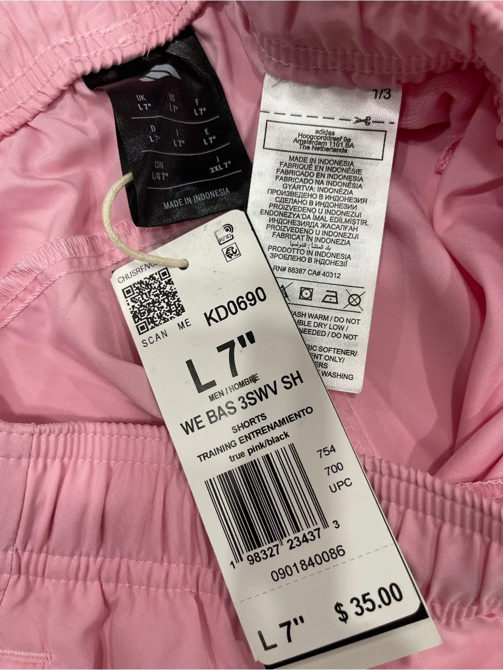 adidas Pink Athletic Shorts with Black Stripe Detail